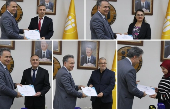 Öğretim üyelerine başarı belgesi