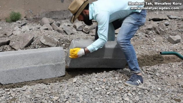 Belediye yol çalışmalarını sürdürüyor