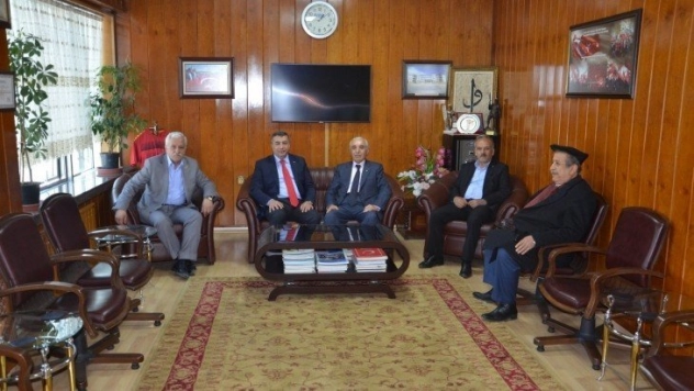 Özcan'dan ESKKK'ya ziyaret