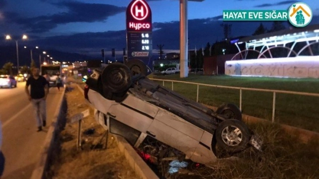 Takla atan otomobilden yara almadan kurtuldu