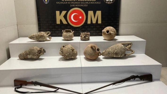 KOM polisi 8 adet amfora küp ve tüfek ele geçirdi