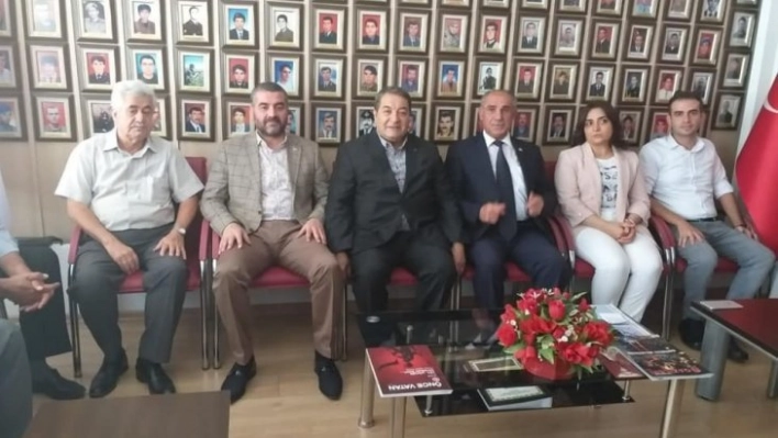 MHP heyetinden şehit ve gazi derneğine ziyaret