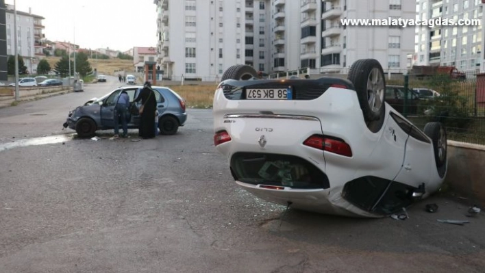 Ters dönen otomobilden burnu bile kanamadan çıktı