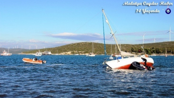 Tsunami ile sürüklenen tekneler denizden çıkartılıyor