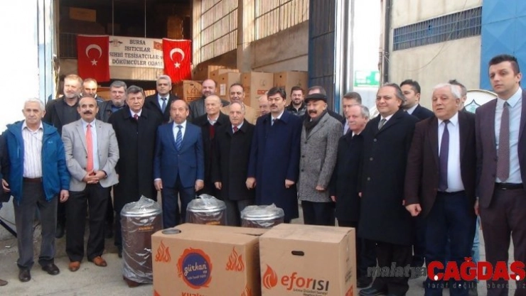 Bursalı sobacılardan ısıtan yardım